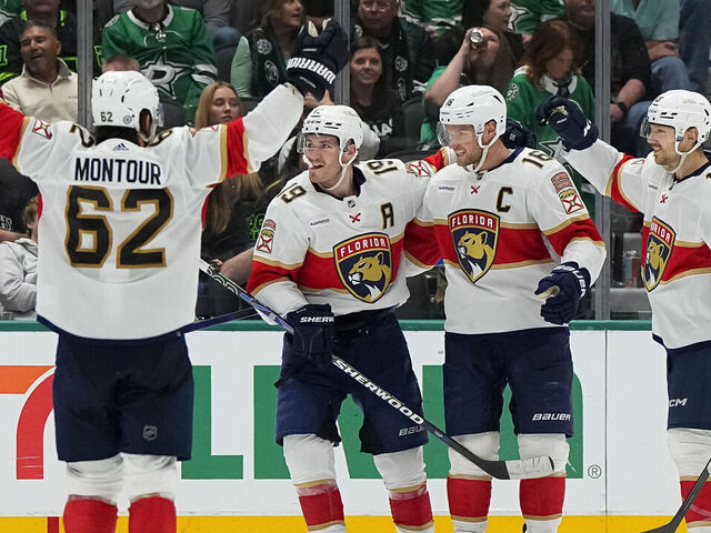 DALLAS, TEXAS - MARCH 12: Aleksander Barkov #16 of the Florida Panthers is congratulated by Matthew Tkachuk #19 and Sam Reinhart #13 after scoring a goal during the third period against the Dallas Starsat American Airlines Center on March 12, 2024 in Dallas, Texas.