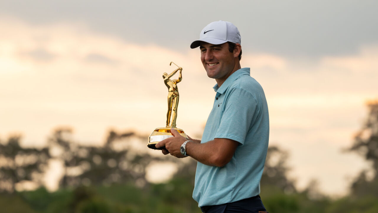 PONTE VEDRA BEACH, FLORIDA - MARCH 12: Scottie Scheffler poses with THE PLAYERS Championship trophy after winning during the final round of THE PLAYERS Championship at Stadium Course at TPC Sawgrass on March 12, 2023 in Ponte Vedra Beach, Florida.