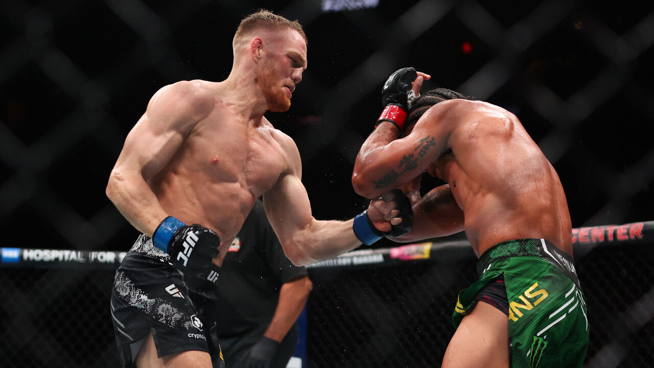 MIAMI, FLORIDA - MARCH 09: Jack Della Maddalena of Australia fights Gilbert Burns of Brazil during their welterweight bout at UFC 299 at Kaseya Center on March 09, 2024 in Miami, Florida.