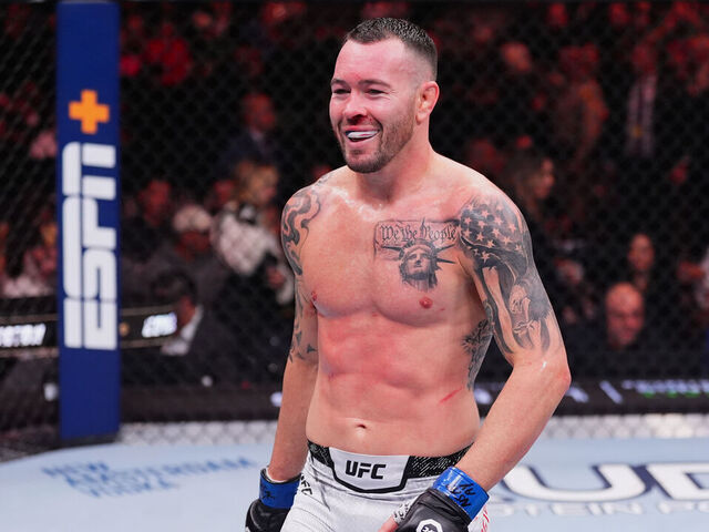 LAS VEGAS, NEVADA - DECEMBER 16: Colby Covington walks to his corner between rounds in the UFC welterweight championship fight during the UFC 296 event at T-Mobile Arena on December 16, 2023 in Las Vegas, Nevada.