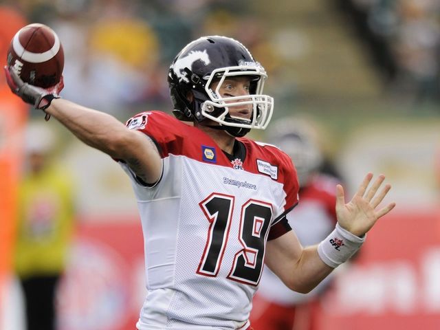 Stampeders hammer Redblacks to move into tie with Eskimos atop CFL standings