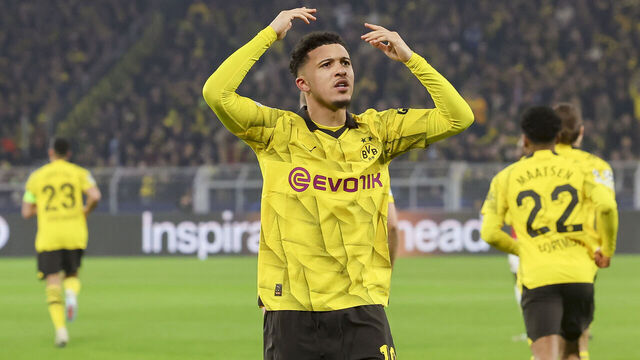 DORTMUND, GERMANY - MARCH 13: Jadon Sancho of Borussia Dortmund celebrates after scoring his teams first goal during the UEFA Champions League 2023/24 round of 16 second leg match between Borussia Dortmund and PSV Eindhoven at Signal Iduna Park on March 13, 2024 in Dortmund, Germany.