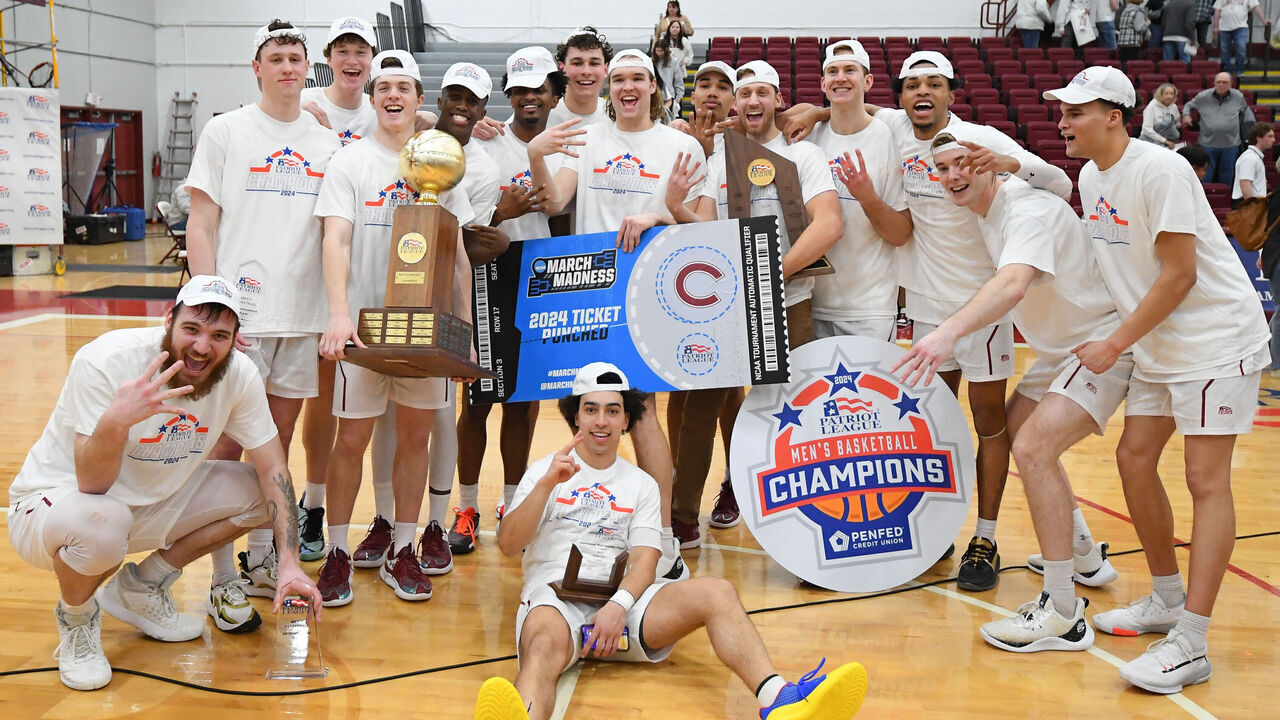 HAMILTON, NEW YORK - MARCH 13: Colgate Raiders players pose for a photo following the Patriot League Basketball Tournament Championship game against the Lehigh Mountain Hawks at the William A. Reid Athletic Center on March 13, 2024 in Hamilton, New York. Colgate won 74-55.