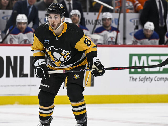 PITTSBURGH, PA - MARCH 10: Pittsburgh Penguins left wing Michael Bunting (8) skates during the second period in the NHL game between the Pittsburgh Penguins and the Edmonton Oilers on March 10, 2024, at PPG Paints Arena in Pittsburgh, PA.