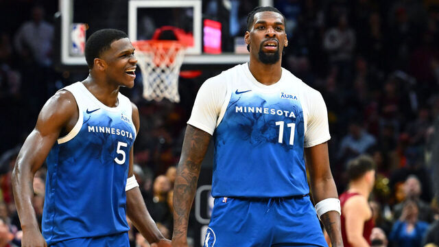 CLEVELAND, OHIO - MARCH 08: Anthony Edwards #5 celebrates with Naz Reid #11 of the Minnesota Timberwolves during the fourth quarter against the Cleveland Cavaliers at Rocket Mortgage Fieldhouse on March 08, 2024 in Cleveland, Ohio. The Cavaliers defeated the Timberwolves 113-104 in overtime.