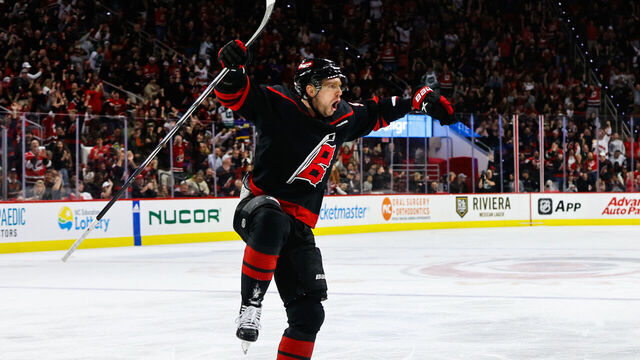 RALEIGH, NC - MARCH 14: Evgeny Kuznetsov #92 of the Carolina Hurricanes celebrates a goal during the second period of the game against the Florida Panthers at PNC Arena on March 14, 2024 in Raleigh, North Carolina.
