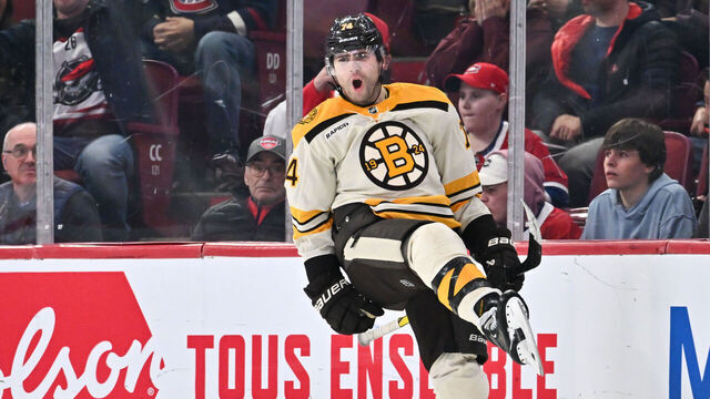 MONTREAL, CANADA - MARCH 14: Jake DeBrusk #74 of the Boston Bruins celebrates his overtime goal against the Montreal Canadiens at the Bell Centre on March 14, 2024 in Montreal, Quebec, Canada. The Boston Bruins defeated the Montreal Canadiens 2-1 in overtime.