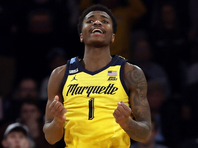 NEW YORK, NEW YORK - MARCH 14: Kam Jones #1 of the Marquette Golden Eagles reacts in overtime against the Villanova Wildcats during the Quarterfinals of the Big East Basketball Tournament at Madison Square Garden on March 14, 2024 in New York City. The Golden Eagles won 71-65.