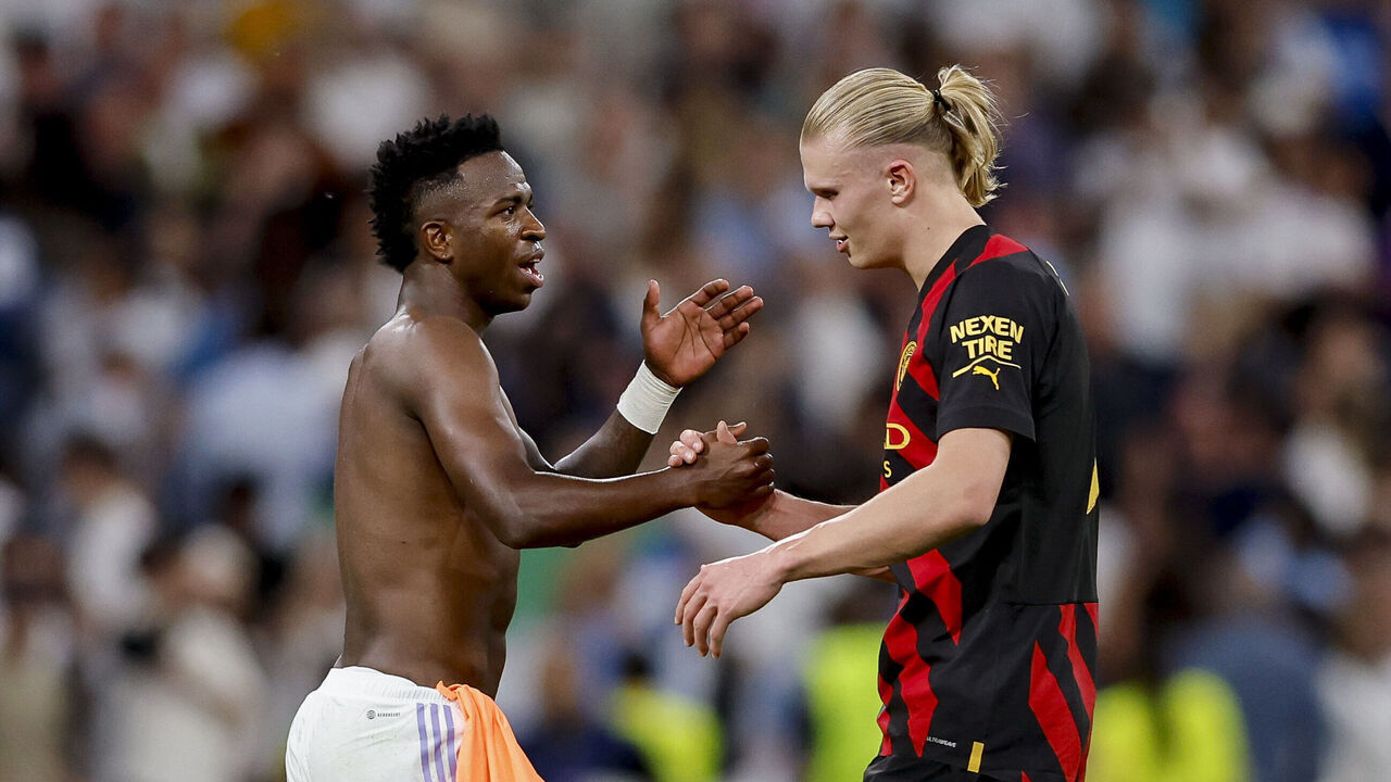 MADRID, SPAIN - MAY 09: Vinicius Junior of Real Madrid and Erling Haaland of Manchester City looks on after the UEFA Champions League semi-final first leg match between Real Madrid and Manchester City FC at Estadio Santiago Bernabeu on May 9, 2023 in Madrid, Spain.