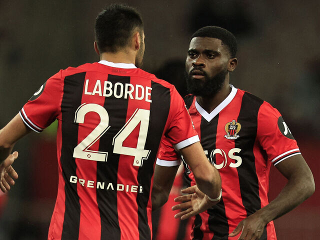Nice's Ivorian French forward #07 Jeremie Boga (R) celebrates scoring his team's first goal during the French L1 football match between OGC Nice and Montpellier Herault SC at the Allianz Riviera Stadium in Nice, south-eastern France, on March 8, 2024.