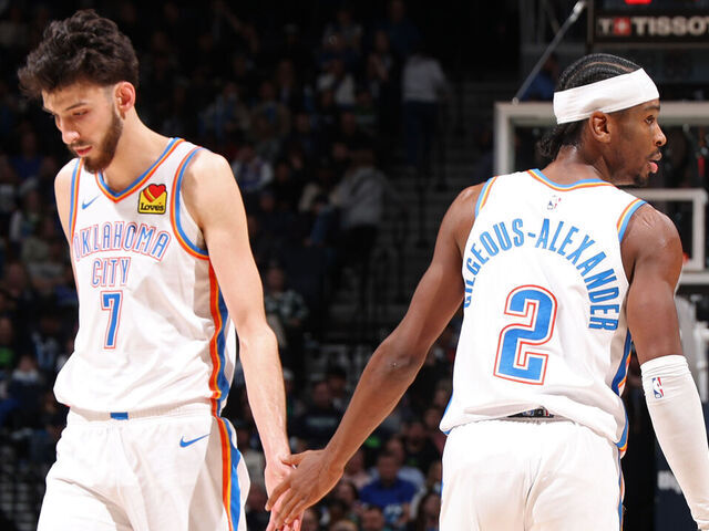 MINNEAPOLIS, MN - JANUARY 20: Chet Holmgren #7 and Shai Gilgeous-Alexander #2 of the Oklahoma City Thunder high five during the game against the Minnesota Timberwolves on January 20, 2024 at Target Center in Minneapolis, Minnesota. Mandatory Copyright Notice: Copyright 2024 NBAE
