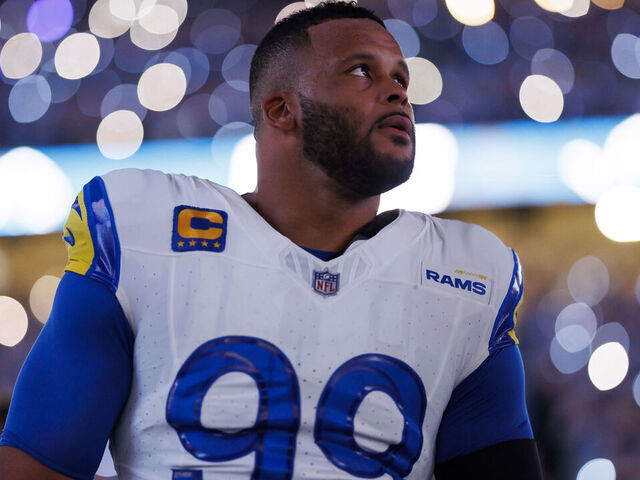 DETROIT, MICHIGAN - JANUARY 14: Aaron Donald #99 of the Los Angeles Rams looks on from the sideline prior to an NFC Wild Card Playoff football game against the Detroit Lions at Ford Field on January 14, 2024 in Detroit, Michigan.
