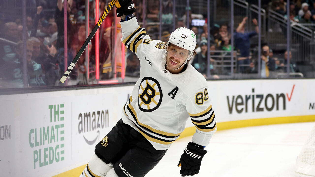 SEATTLE, WASHINGTON - FEBRUARY 26: David Pastrnak #88 of the Boston Bruins celebrates his goal and 700th NHL point during the first period against the Seattle Kraken at Climate Pledge Arena on February 26, 2024 in Seattle, Washington.