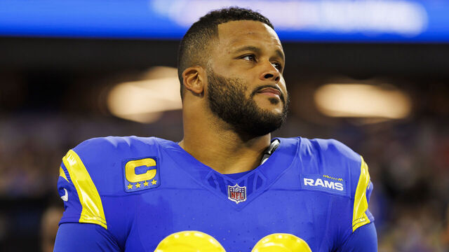 INGLEWOOD, CA - DECEMBER 21: Aaron Donald #99 of the Los Angeles Rams looks on from the sideline before an NFL game against the New Orleans Saints at SoFi Stadium on December 21, 2023 in Inglewood, California.