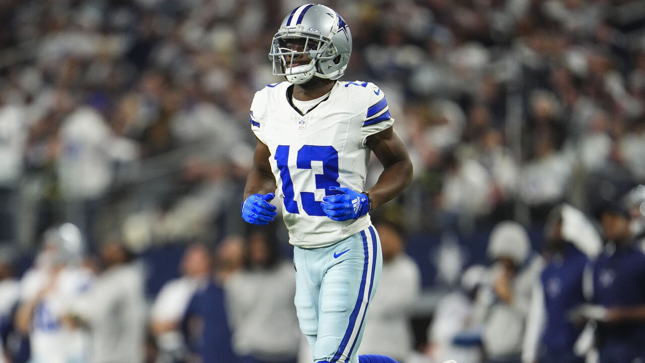 DALLAS, TX - JANUARY 14: Michael Gallup #13 of the Dallas Cowboys runs across the field during an NFL wild-card playoff football game against the Green Bay Packers at AT&T Stadium on January 14, 2024 in Dallas, Texas.
