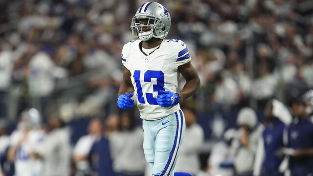 DALLAS, TX - JANUARY 14: Michael Gallup #13 of the Dallas Cowboys runs across the field during an NFL wild-card playoff football game against the Green Bay Packers at AT&T Stadium on January 14, 2024 in Dallas, Texas.