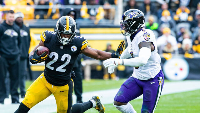 PITTSBURGH, PA - DECEMBER 11: Pittsburgh Steelers running back Najee Harris (22) gives Baltimore Ravens linebacker Patrick Queen (6) a stuff arm during the national football league game between the Baltimore Ravens and the Pittsburgh Steelers on December 11, 2022 at Acrisure Stadium in Pittsburgh, PA.