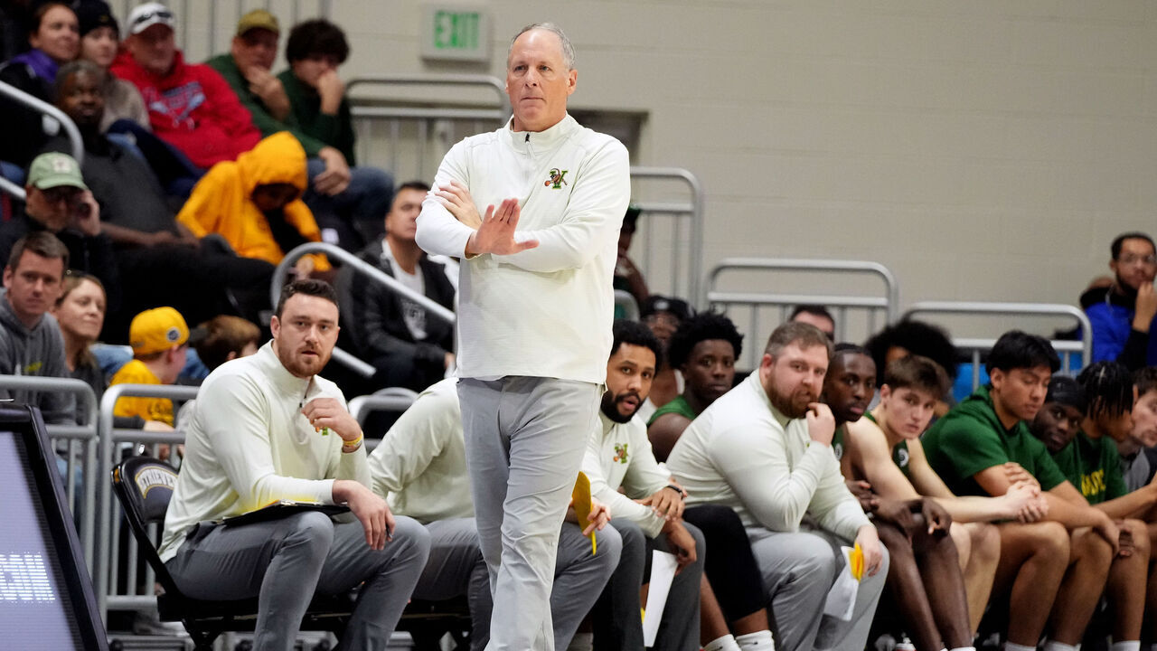 CATONSVILLE, MD - JANUARY 01: Head coach John Becker of the Vermont Catamounts looks on during a college basketball game against the UMBC Retrievers at the Chesapeake Employers Insurance Arena on January 1, 2023 in Catonsville, Maryland