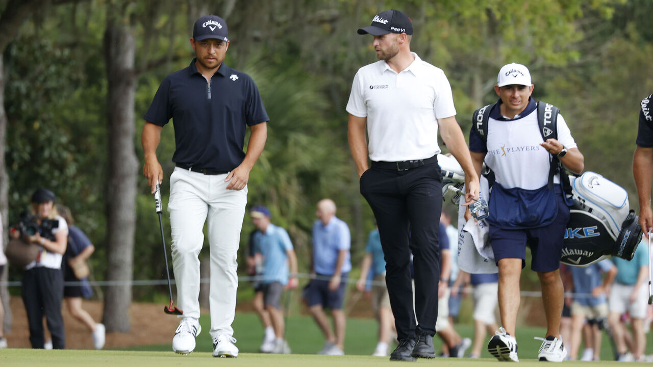 PONTE VEDRA BEACH, FL - MARCH 16: PGA golfers Xander Schauffele and Wyndham Clark walk the 3rd hole during the third round of The Players Championship on March 16, 2024, at TPC Sawgrass in Ponte Vedra Beach, Florida.