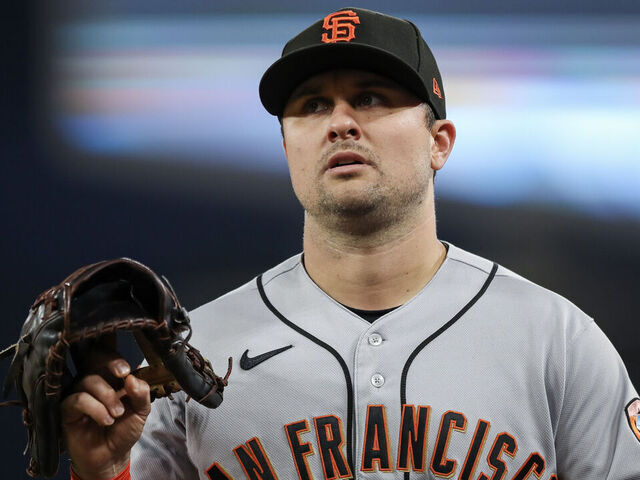 LOS ANGELES, CALIFORNIA - SEPTEMBER 22: J.D. Davis #7 of the San Francisco Giants warms up before the game against the Los Angeles Dodgers at Dodger Stadium on September 22, 2023 in Los Angeles, California.