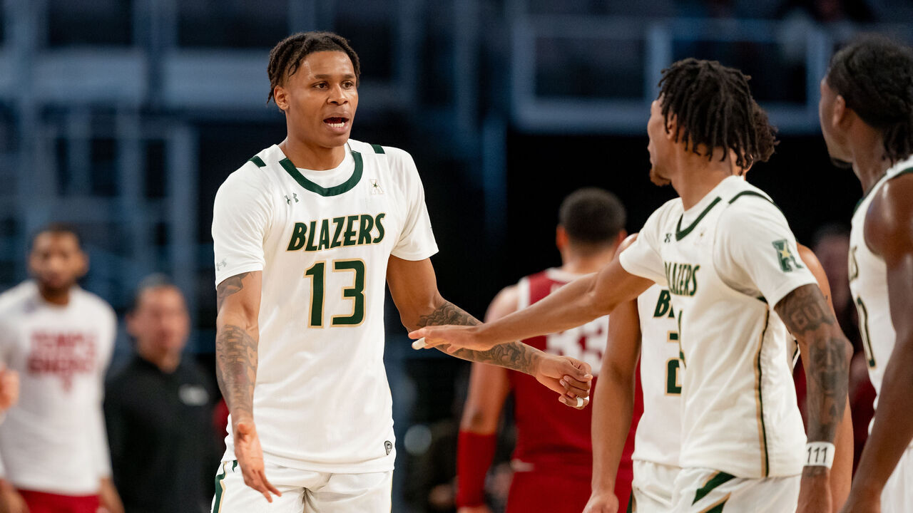 FORT WORTH, TX - MARCH 17: Temple Owls guard Connor Gal (13) high fives teammates after a called timeout during the American Athletic Conference Championship game between the Temple Owls and the UAB Blazers on March 17, 2024 at Dickies Arena in Fort Worth, Texas.