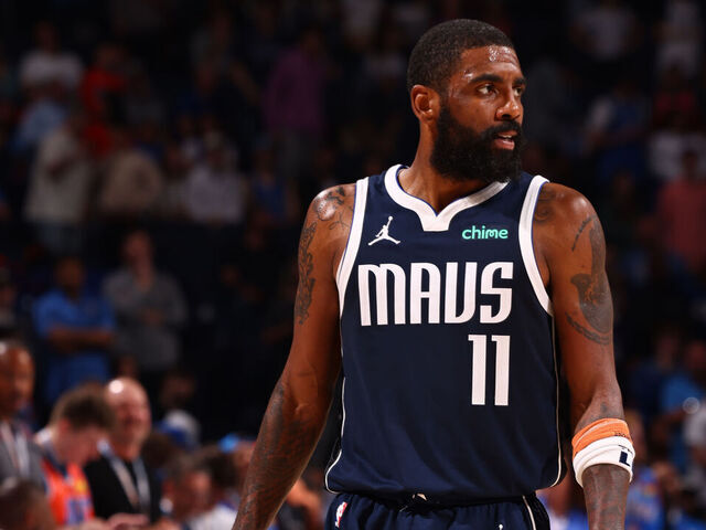 OKLAHOMA CITY, OK - MARCH 14: Kyrie Irving #11 of the Dallas Mavericks looks on during the game against the Oklahoma City Thunder on March 13, 2024 at Paycom Arena in Oklahoma City, Oklahoma. Mandatory Copyright Notice: Copyright 2024 NBAE