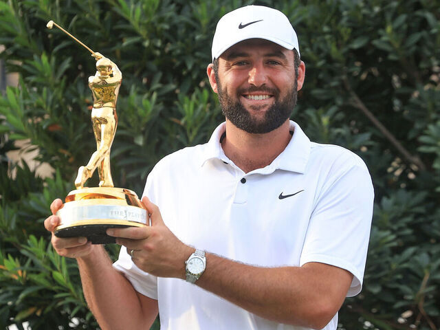 PONTE VEDRA BEACH, FLORIDA - MARCH 17: Scottie Scheffler of The United States holds the trophy after the final round of THE PLAYERS Championship at TPC Sawgrass on March 17, 2024 in Ponte Vedra Beach, Florida.