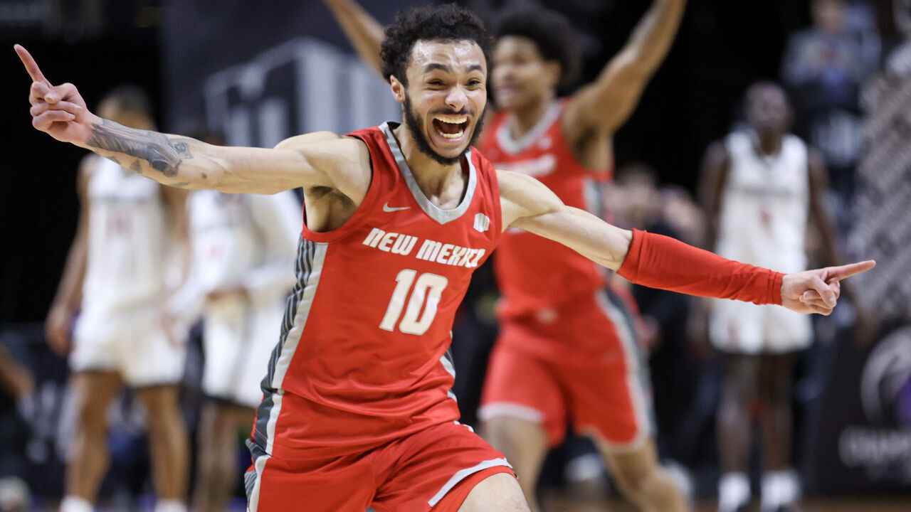 LAS VEGAS, NEVADA - MARCH 16: Jaelen House #10 celebrates after defeating the San Diego State Aztecs in the championship game of the Mountain West basketball tournament at the Thomas & Mack Center on March 16, 2024 in Las Vegas, Nevada. The Lobos won 68-61.