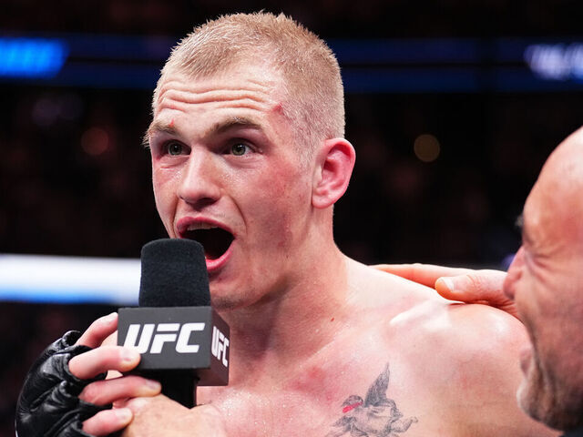 ANAHEIM, CALIFORNIA - FEBRUARY 17: Ian Garry of Ireland reacts after his split-decision victory against Geoff Neal in a welterweight fight during the UFC 298 event at Honda Center on February 17, 2024 in Anaheim, California.
