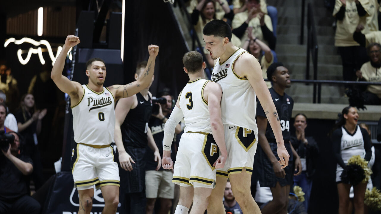 WEST LAFAYETTE, IN - MARCH 02: Purdue Boilermakers guard Braden Smith (3) give center Zach Edey (15) a chest bump during a game against the Michigan State Spartans on March 2, 2024, at Mackey Arena in West Lafayette, Indiana.