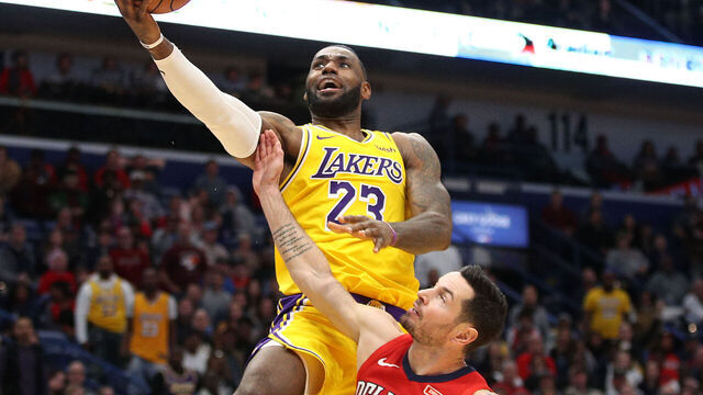 NEW ORLEANS, LOUISIANA - NOVEMBER 27: LeBron James #23 of the Los Angeles Lakers shoots the ball over JJ Redick #4 of the New Orleans Pelicans at Smoothie King Center on November 27, 2019 in New Orleans, Louisiana. NOTE TO USER: User expressly acknowledges and agrees that, by downloading and/or using this photograph, user is consenting to the terms and conditions of the Getty Images License Agreement