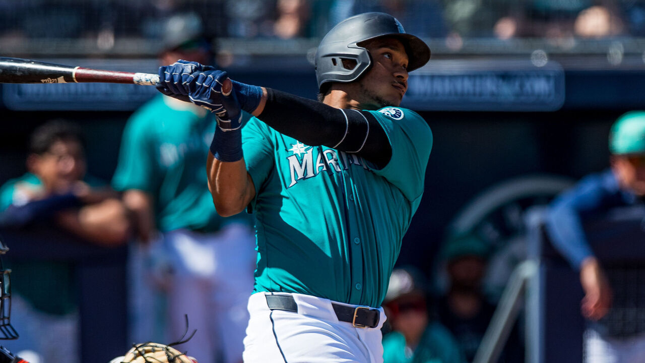 PEORIA, ARIZONA - MARCH 10: Jorge Polanco #7 of the Seattle Mariners hits a grand slam during the second inning of Spring Training game against the San Francisco Giants at Peoria Sports Complex on March 10, 2024 in Peoria, Arizona.