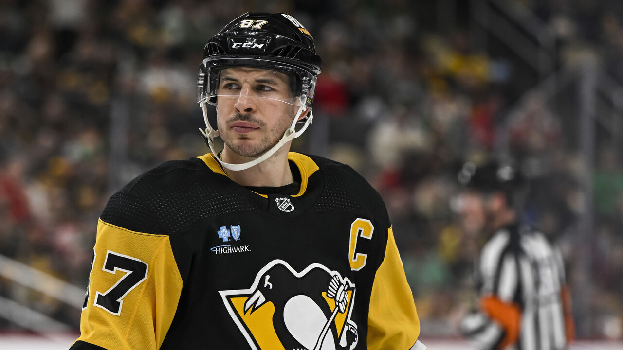 PITTSBURGH, PA - MARCH 17: Pittsburgh Penguins center Sidney Crosby (87) looks on during the second period in the NHL game between the Pittsburgh Penguins and the Detroit Red Wings on March 17, 2024, at PPG Paints Arena in Pittsburgh, PA.