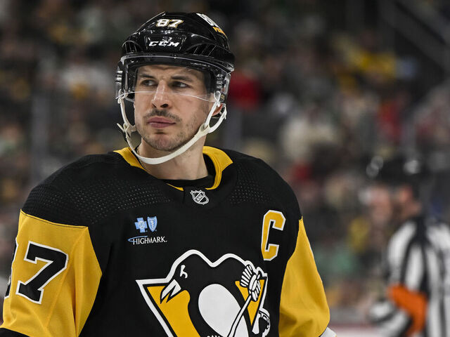 PITTSBURGH, PA - MARCH 17: Pittsburgh Penguins center Sidney Crosby (87) looks on during the second period in the NHL game between the Pittsburgh Penguins and the Detroit Red Wings on March 17, 2024, at PPG Paints Arena in Pittsburgh, PA.