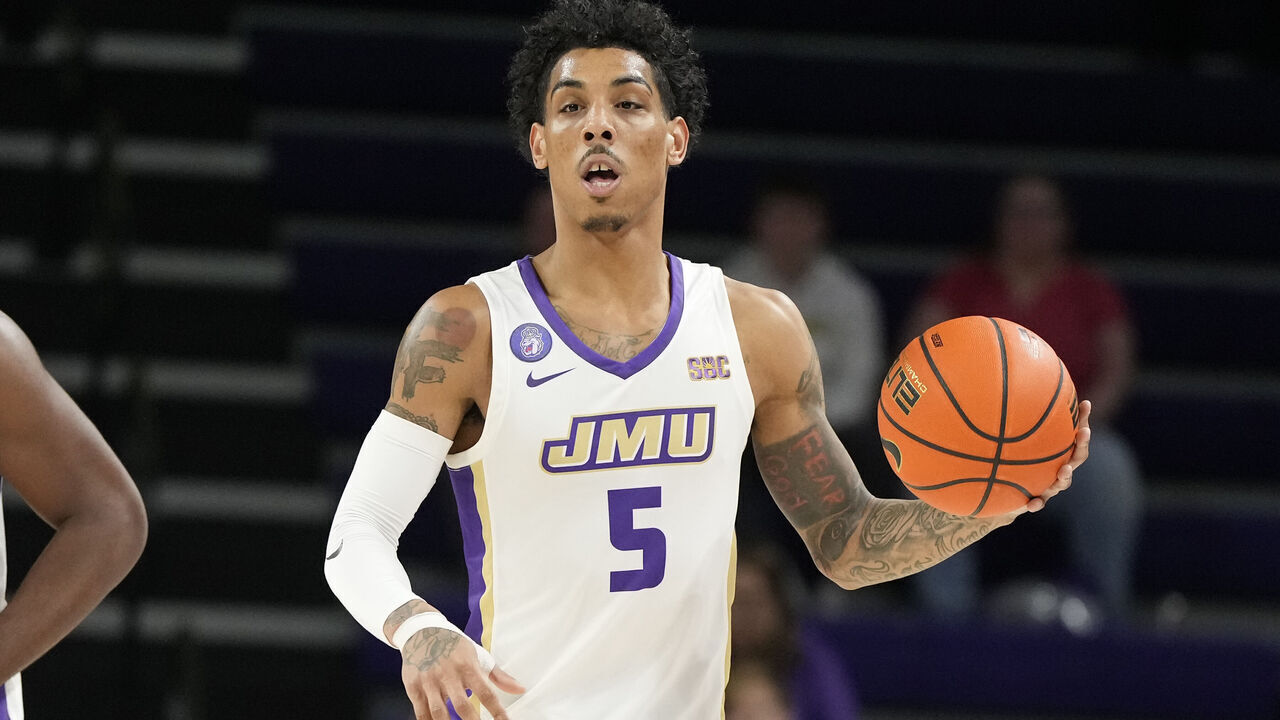 HARRISONBURG, VA - JANUARY 11: Terrence Edwards Jr. #5 of the James Madison Dukes dribbles the ball during a college basketball game against the South Alabama Jaguars at the Atlantic Union Bank Center on January 11, 2024 in Harrisonburg, Virginia.