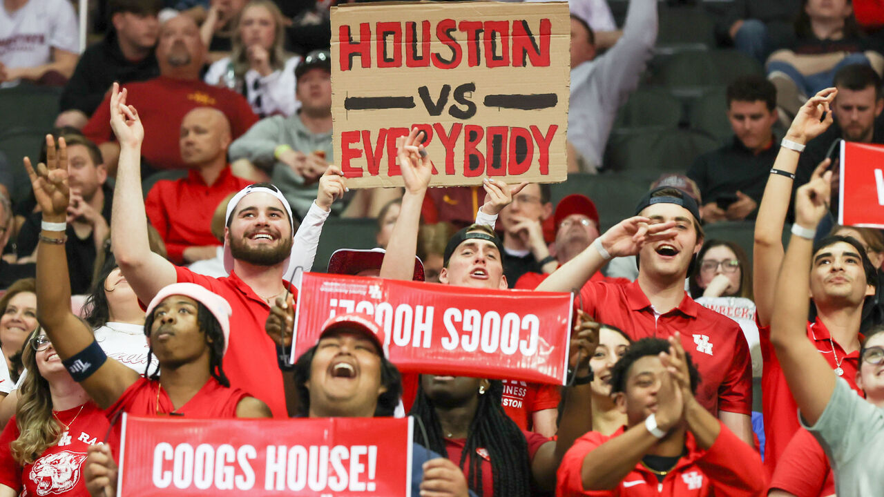 KANSAS CITY, MO - MARCH 15: Houston Cougars fans hold a sign saying "Houston v Everyone" in the second half of a Big 12 tournament semifinal game between the Texas Tech Red Raiders and Houston Cougars on Mar 15, 2024 at T-Mobile Center in Kansas City, MO.