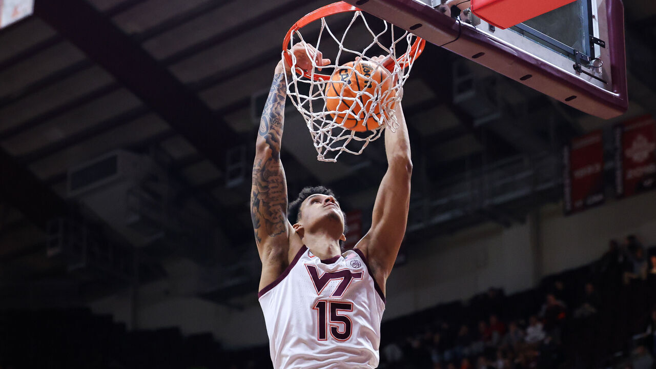 BLACKSBURG, VIRGINIA - MARCH 19: Lynn Kidd #15 of the Virginia Tech Hokies dunks the ball in the second half during the first round of the NIT tournament game against the Richmond Spiders at Cassell Coliseum on March 19, 2024 in Blacksburg, Virginia.