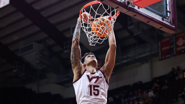 BLACKSBURG, VIRGINIA - MARCH 19: Lynn Kidd #15 of the Virginia Tech Hokies dunks the ball in the second half during the first round of the NIT tournament game against the Richmond Spiders at Cassell Coliseum on March 19, 2024 in Blacksburg, Virginia.