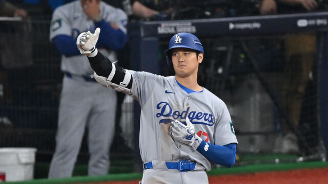 Los Angeles Dodgers' Shohei Ohtani reacts on first base during the third inning of the 2024 MLB Seoul Series baseball game between Los Angeles Dodgers and San Diego Padres at the Gocheok Sky Dome in Seoul on March 20, 2024.