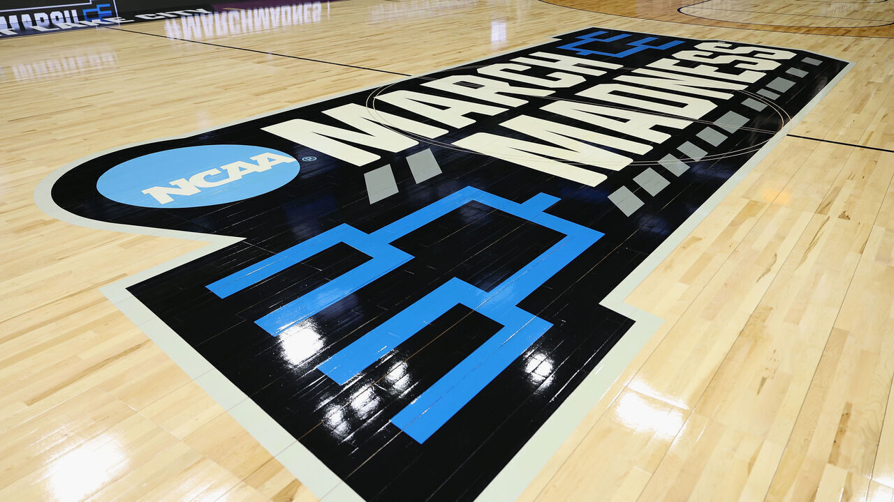 SALT LAKE CITY, UTAH - MARCH 20: Detail of the March Madness logo on the court ahead of the NCAA Men's Basketball Tournament at Delta Center on March 20, 2024 in Salt Lake City, Utah.