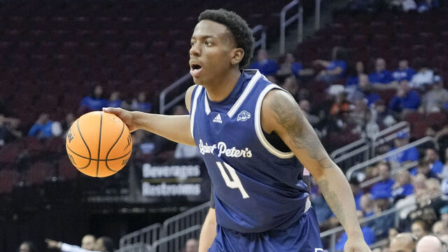 NEWARK, NJ - NOVEMBER 6: Roy Clarke #4 of the St. Peter's Peacocks dribbles the ball during the game against the Seton Hall Pirates at Prudential Center on November 6, 2023 in Newark, NJ.