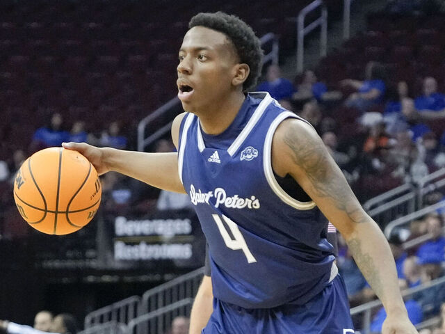 NEWARK, NJ - NOVEMBER 6: Roy Clarke #4 of the St. Peter's Peacocks dribbles the ball during the game against the Seton Hall Pirates at Prudential Center on November 6, 2023 in Newark, NJ.