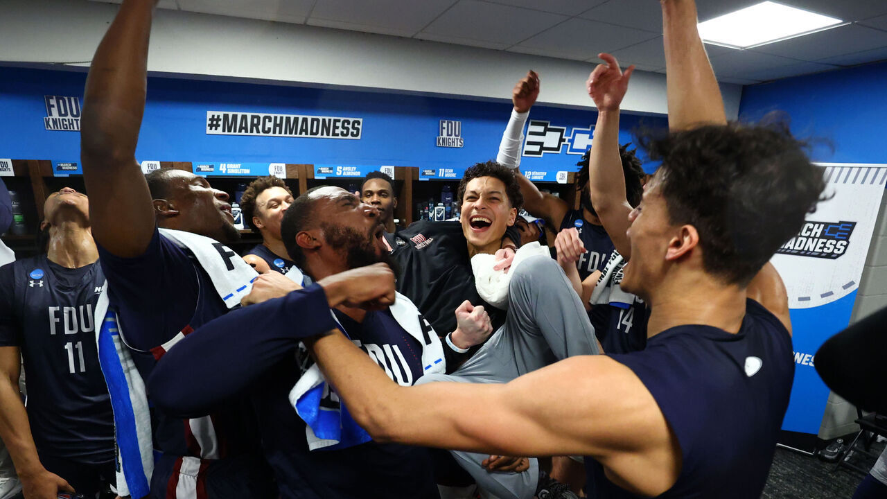 COLUMBUS, OH - MARCH 17: Players from the Fairleigh Dickinson Knights celebrate their win over the Purdue Boilermakers during the first round of the 2023 NCAA Men's Basketball Tournament held at Nationwide Arena on March 17, 2023 in Columbus, Ohio.