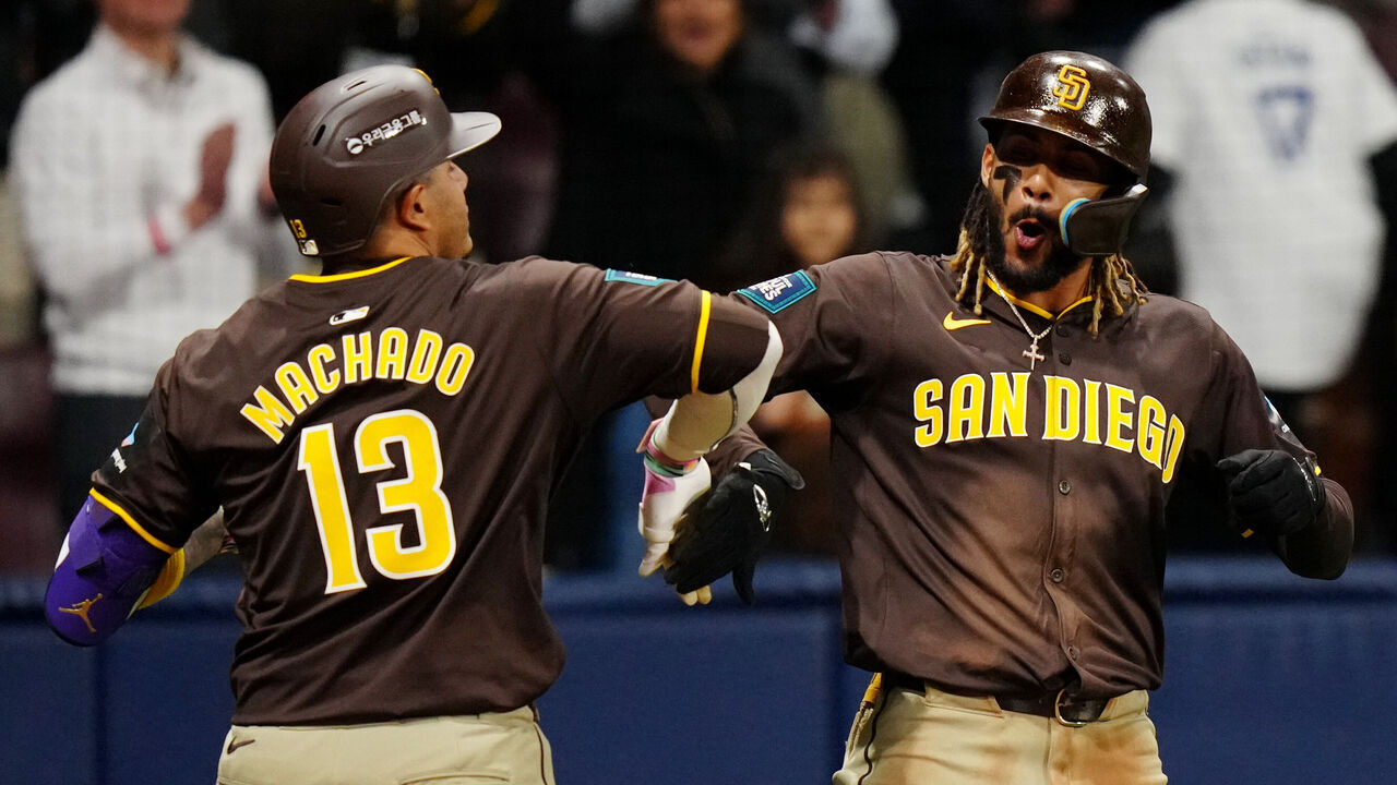 SEOUL, SOUTH KOREA - MARCH 21: Manny Machado #13 of the San Diego Padres celebrates with teammate Fernando Tatis Jr. #23 after hitting a three-run home run in the ninth inning during the 2024 Seoul Series game between the San Diego Padres and the Los Angeles Dodgers at Gocheok Sky Dome on Thursday, March 21, 2024 in Seoul, California.