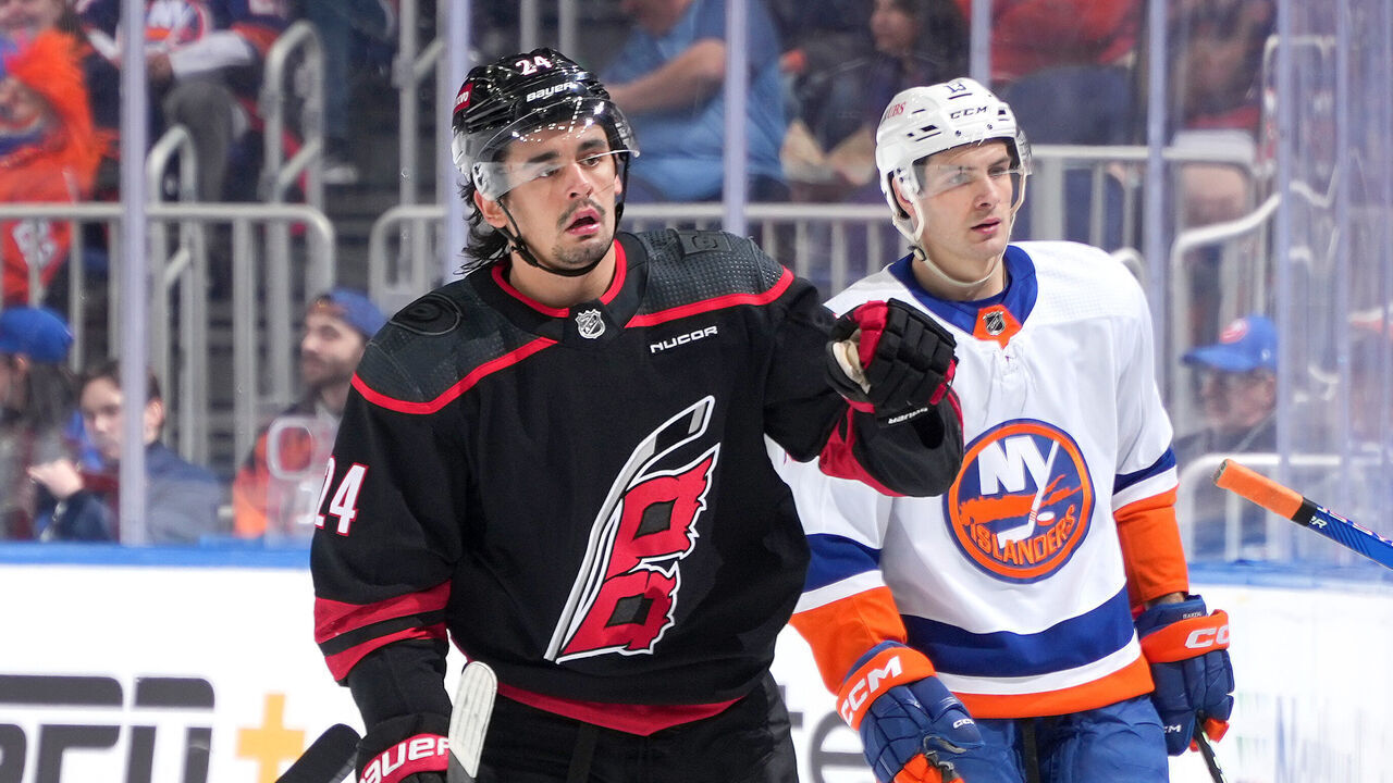 ELMONT, NEW YORK - MARCH 19: Seth Jarvis #24 of the Carolina Hurricanes celebrates after scoring a goal against the New York Islanders during the first period at UBS Arena on March 19, 2024 in Elmont, New York.