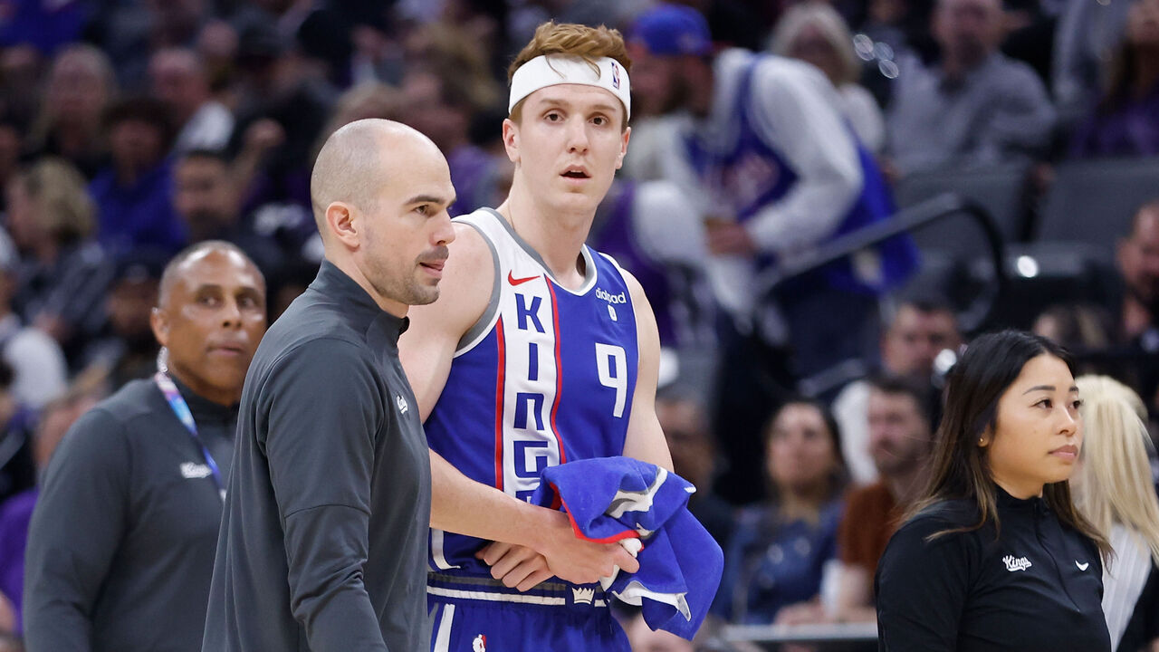 SACRAMENTO, CALIFORNIA - MARCH 18: Kevin Huerter #9 of the Sacramento Kings reacts after getting injured on a play in the first quarter against the Memphis Grizzlies at Golden 1 Center on March 18, 2024 in Sacramento, California.