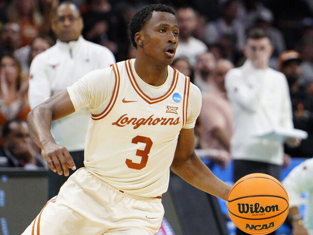 CHARLOTTE, NORTH CAROLINA - MARCH 21: Max Abmas #3 of the Texas Longhorns dribbles the ball during the first half against the Colorado State Rams in the first round of the NCAA Men's Basketball Tournament at Spectrum Center on March 21, 2024 in Charlotte, North Carolina.