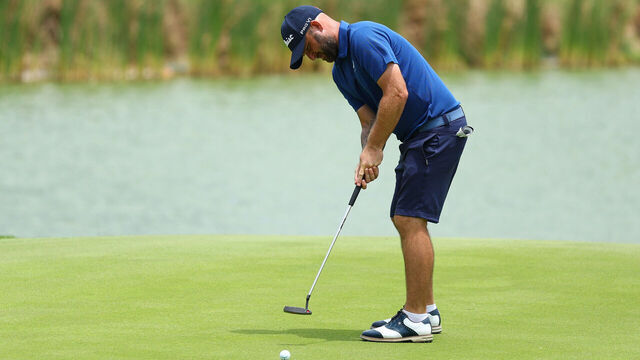 SINGAPORE, SINGAPORE - MARCH 22: Andy Sullivan of England putts on the ninth green during Day Two of the Porsche Singapore Classic at Laguna National Golf Resort Club on March 22, 2024 in Singapore.