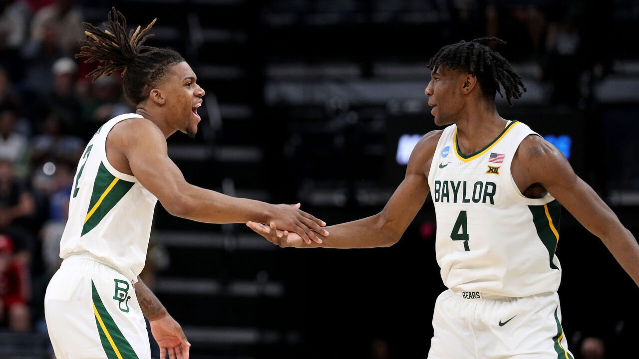 MEMPHIS, TENNESSEE - MARCH 22: Jayden Nunn #2 and Ja'Kobe Walter #4 of the Baylor Bears reacts to a play in the first round of the NCAA Men's Basketball Tournament against the Colgate Raiders at FedExForum on March 22, 2024 in Memphis, Tennessee.