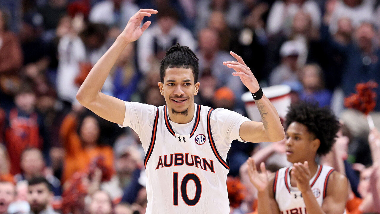 NASHVILLE, TENNESSEE - MARCH 17: Chad Baker-Mazara #10 of the Auburn Tigers reacts against the Florida Gators during the first half of the SEC Tournament Championship game at Bridgestone Arena on March 17, 2024 in Nashville, Tennessee.